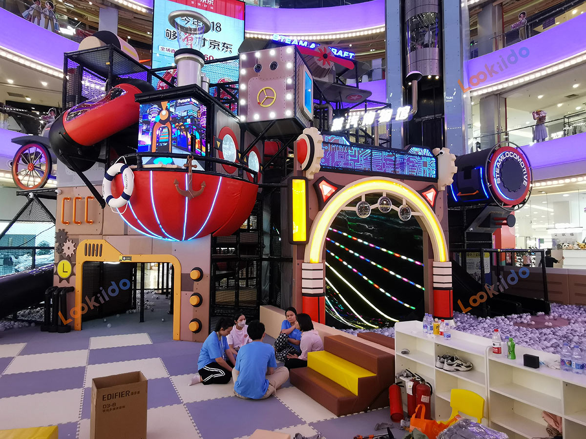 Real shot of retro steam train-shaped soft play playground