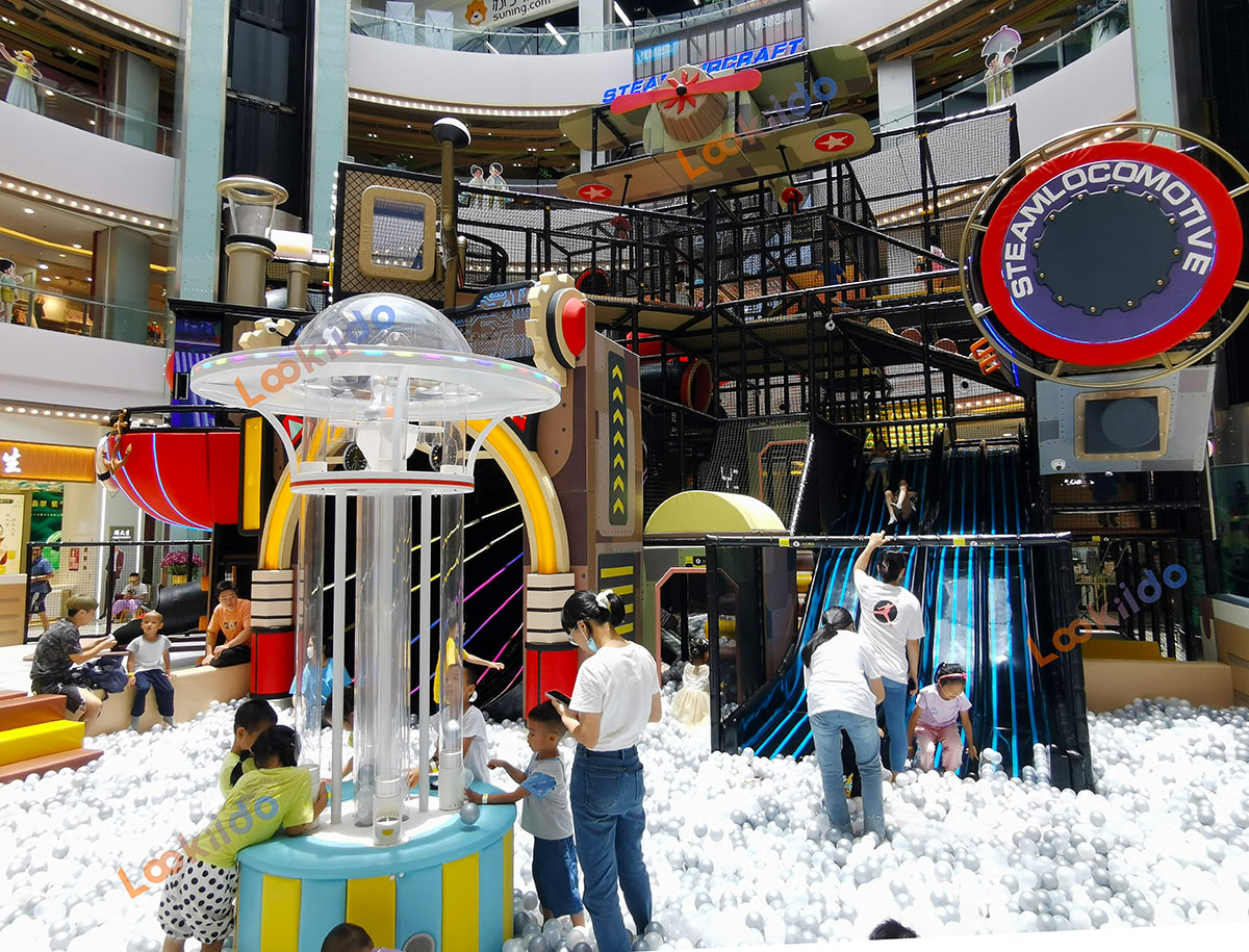 Real shot of retro steam train-shaped soft play playground