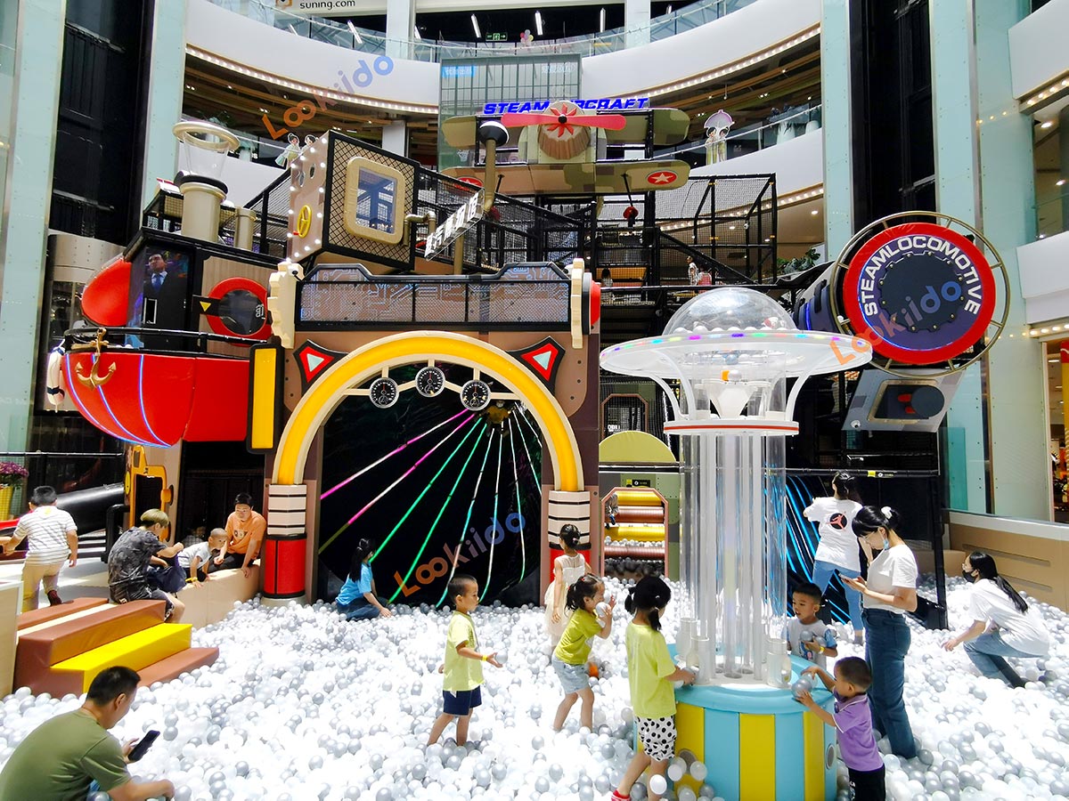 Real shot of retro steam train-shaped soft play playground